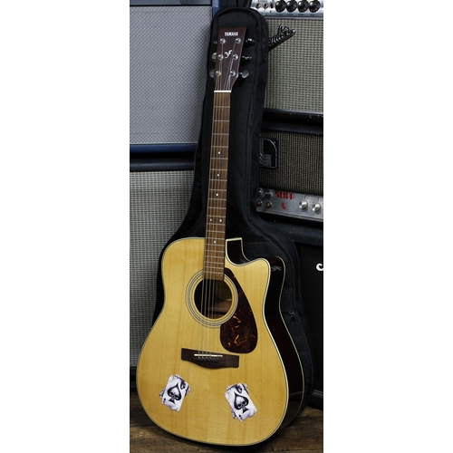 593 - Yamaha FX370C electro-acoustic guitar, orange refinished painted back, stickers applied to top, with... 