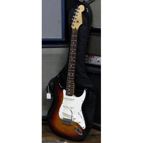 610 - Squier by Fender Silver Series Stratocaster electric guitar, made in Japan, ser. no. L004756; Body: ... 