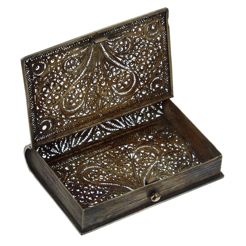 762 - Ornate gilt metal filigree card case modelled as a book, 2.25