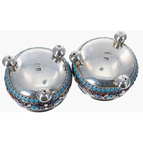 779 - Pair of Russian silver and cloisonné open salt cellars, decorated with scrolling foliate and floral ... 