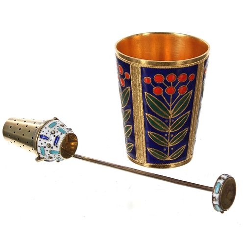 784 - Russian silver gilt and cloisonné vodka tot, decorated with stylised leaf and berry panels, makers m... 