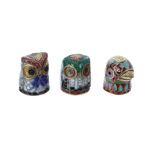 801 - Three Russian cloisonné enamelled thimbles, modelled as owl and bird heads, 1