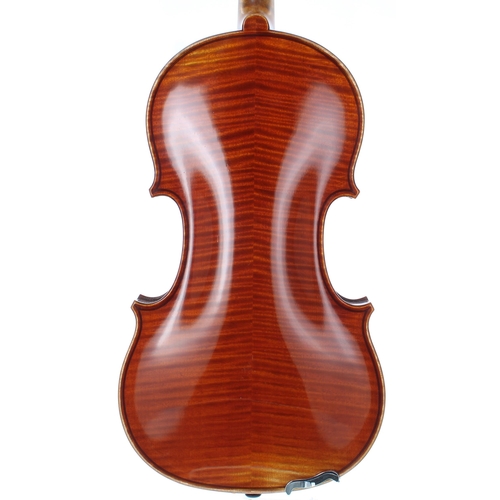 2448 - Violin labelled EM Reims, Ste Cecile de Champagne no. 6 Anno 1905, the two piece back of medium curl... 