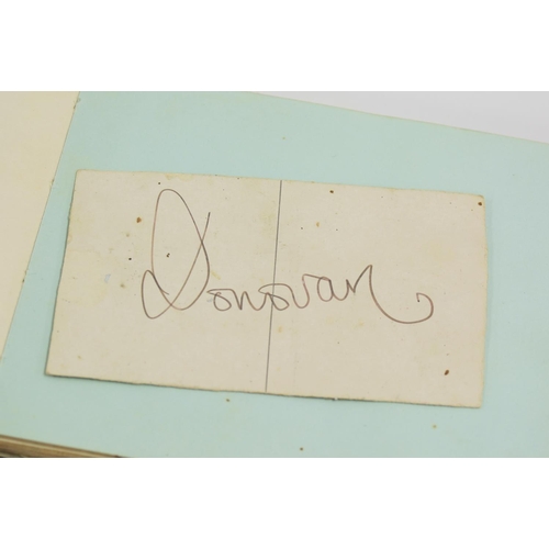 454 - The Rolling Stones and others - old autograph book containing a selection of artist and other autogr... 