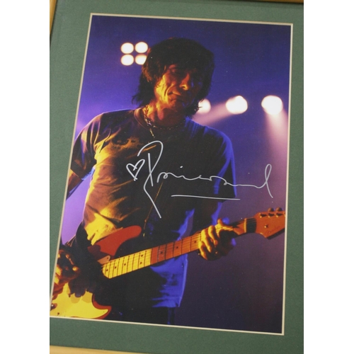 472 - Ronnie Wood - autographed coloured photograph, glazed and framed, 13