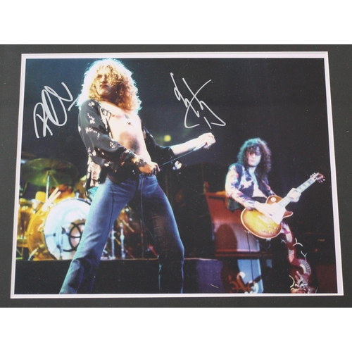 475 - Robert Plant and Jimmy Page - autographed colour photograph, framed and glazed, 12.75