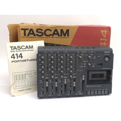 1323 - Tascam 414 Portastudio, boxed*Please note: Gardiner Houlgate do not guarantee the full working order... 