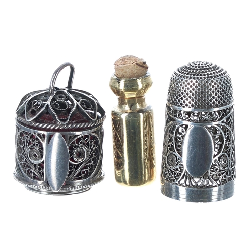 826 - 19th century silver filigree combination thimble/scent bottle/tape measure, the thimble with plain o... 