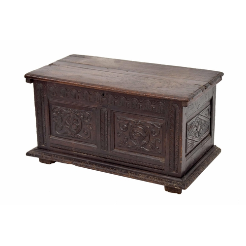 1331 - 18th century Continental oak coffer/chest, the hinged cover enclosing an open interior over sides wi... 