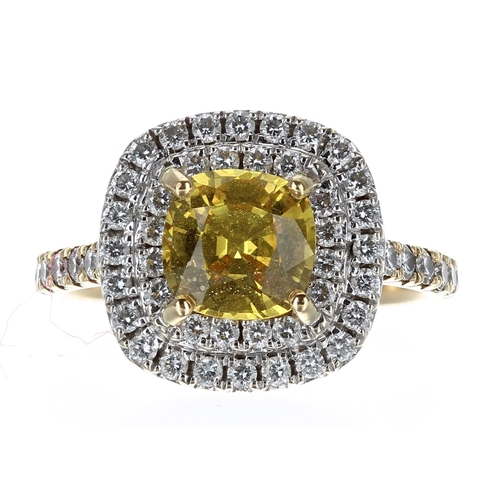 624 - Attractive 18ct yellow sapphire and diamond cluster ring and set shoulders, the sapphire 1.10ct appr... 