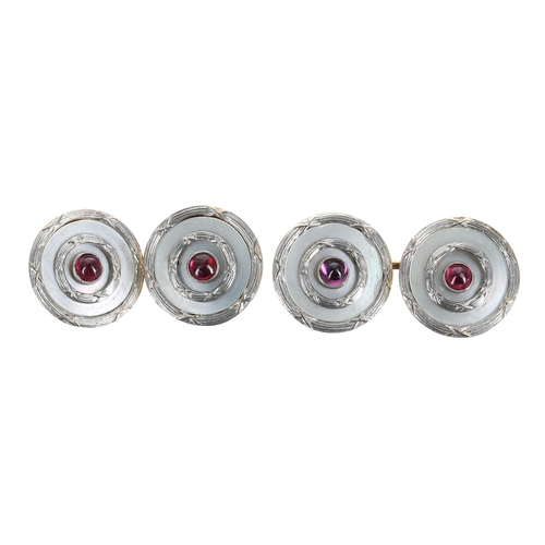 633 - Pair of platinum and 9ct mother of pearl and red gem set cabouchon cufflinks, 6.5gm, 14mm diameter... 