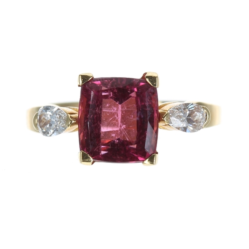 635 - 18ct yellow gold pink tourmaline and pear shaped diamond three stone ring, the tourmaline 1.75ct app... 