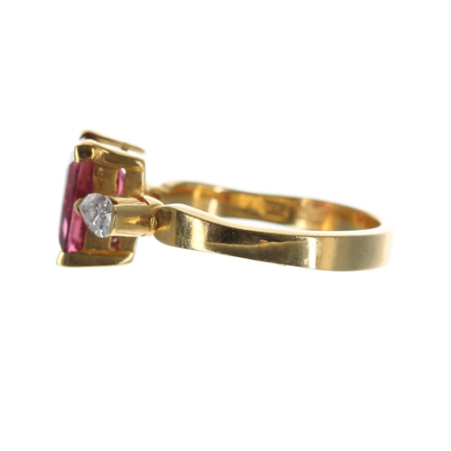 635 - 18ct yellow gold pink tourmaline and pear shaped diamond three stone ring, the tourmaline 1.75ct app... 