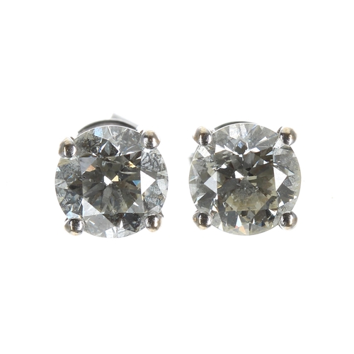 641 - Pair of 18ct white gold diamond stud earrings, round old-cuts, 1.80ct approx in total, clarity SI, c... 