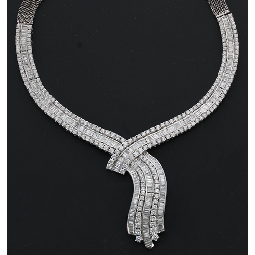 640 - Stunning white gold diamond necklace, with a mesh attachment and set with round brilliant and baguet... 