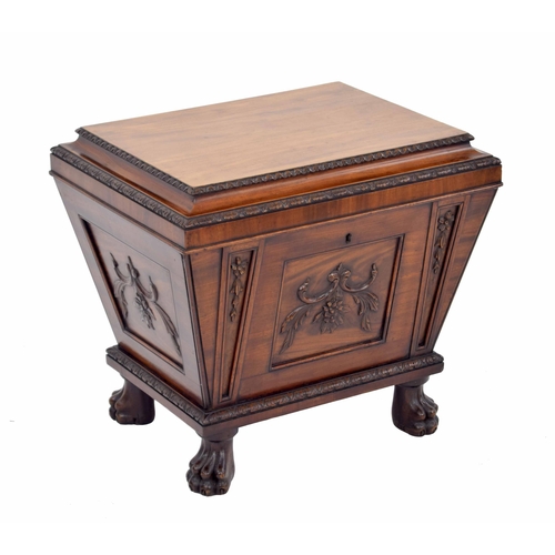 569 - Fine Regency mahogany cellarette, of sarcophagus form with a hinged cover enclosing a metal lined in... 