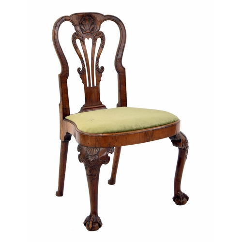 559 - Fine George I walnut side chair, the curved top rail with a central shell motif above a bird head an... 