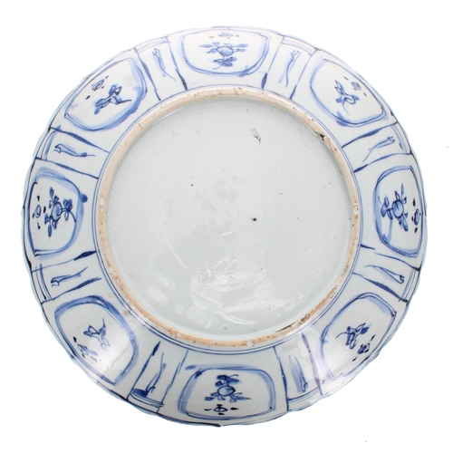 226 - Chinese blue and white porcelain circular dish, in the 'Kraak' style, the centre decorated with bird... 