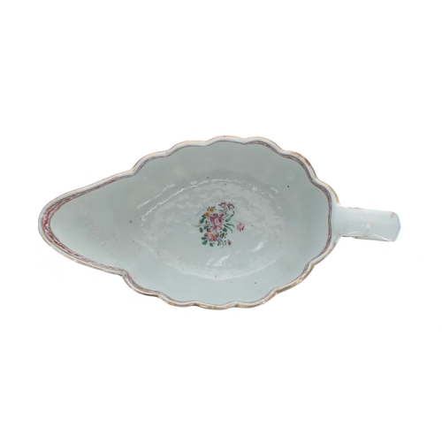 235 - Chinese export porcelain armorial sauce boat of oval lobed form, painted in famille rose enamel... 