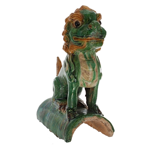 246 - Chinese sancai glaze roof tile modelled as a seated Buddhist lion, 11