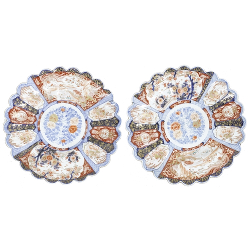 280 - Impressive large pair of Japanese Imari porcelain fluted wall chargers, each with foliate designs to... 