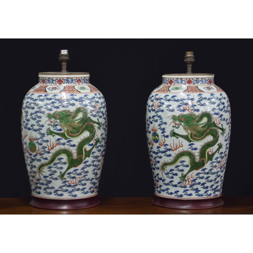 270 - Good pair of large Chinese porcelain vases converted to table lamps, profusely decorated with green ... 