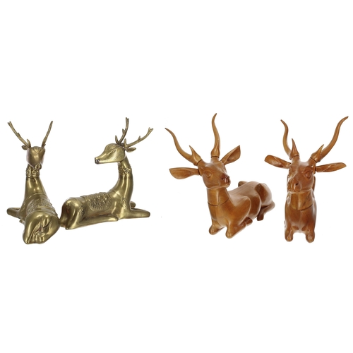 112 - Pair of brass recumbent elk figures, 8