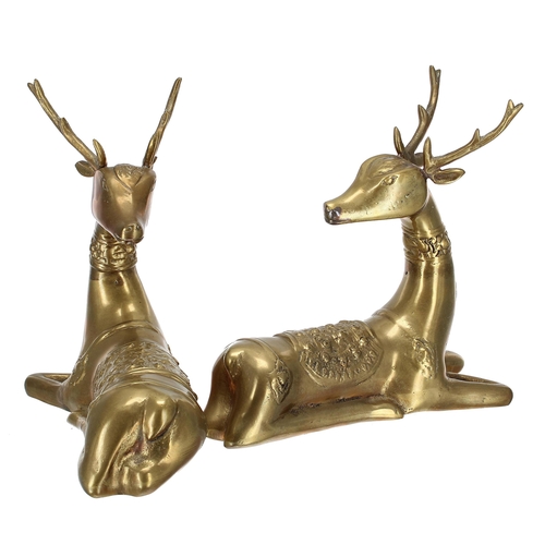 112 - Pair of brass recumbent elk figures, 8