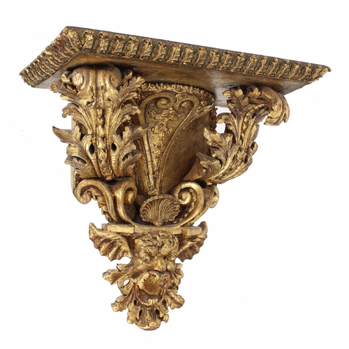 47 - Impressive ornate carved gilt wooden wall bracket, with a acanthus leaf border raised on scrolling c... 