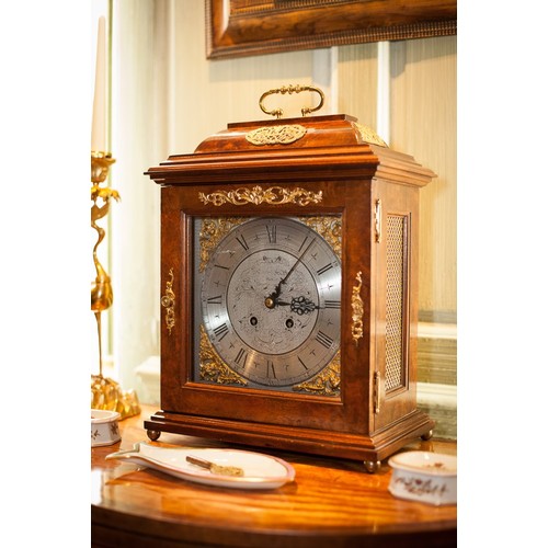 82 - Georgian style walnut and brass mounted two train bracket clock, the 8.5