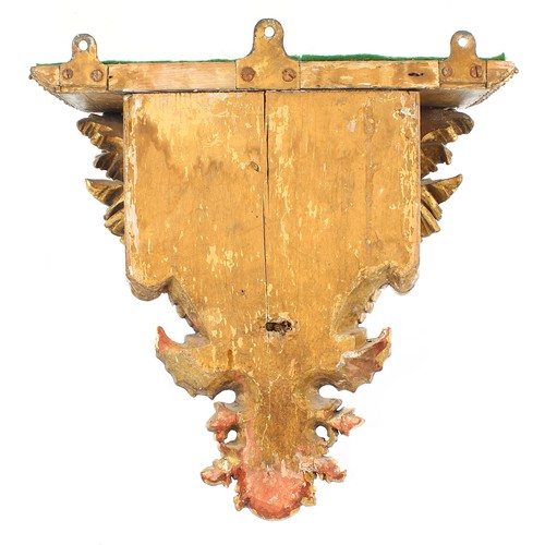 47 - Impressive ornate carved gilt wooden wall bracket, with a acanthus leaf border raised on scrolling c... 