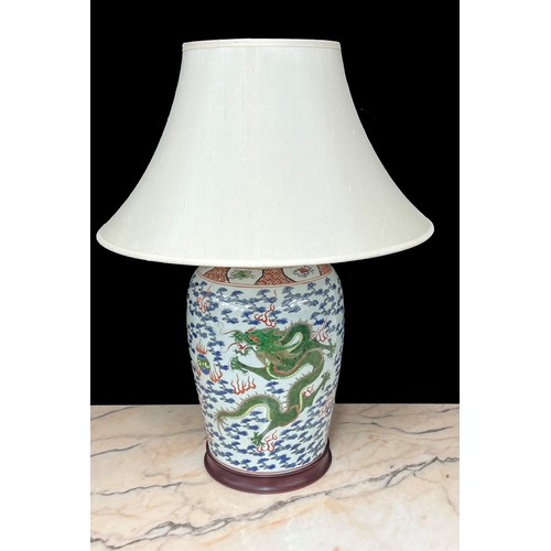 270 - Good pair of large Chinese porcelain vases converted to table lamps, profusely decorated with green ... 