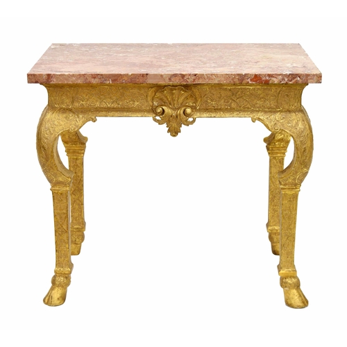 567 - George I giltwood side table in the manner of James Moore, the breche violette marble top over a car... 