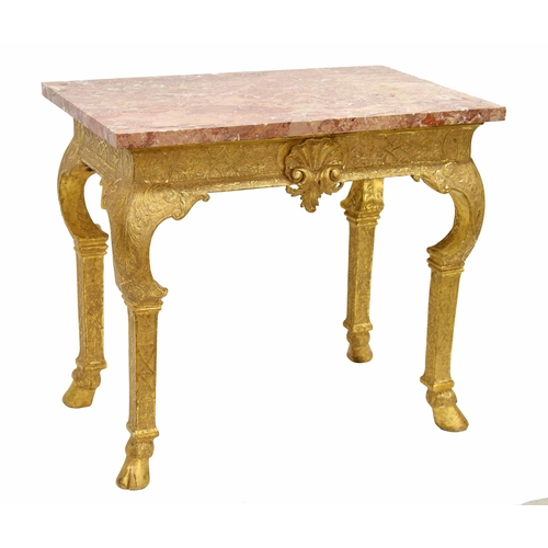 567 - George I giltwood side table in the manner of James Moore, the breche violette marble top over a car... 