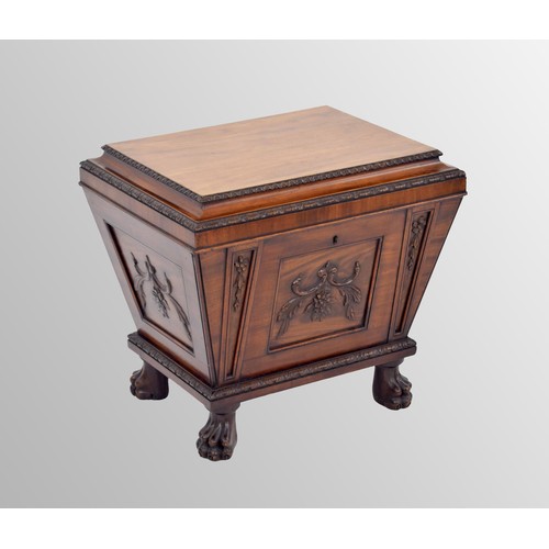 569 - Fine Regency mahogany cellarette, of sarcophagus form with a hinged cover enclosing a metal lined in... 