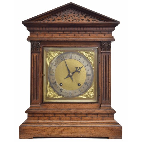 2316 - German oak ting-tang mantel clock, the W & H movement striking on two gongs, the 7