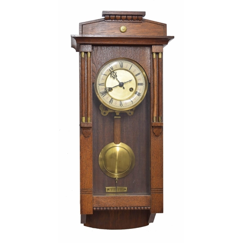 2608 - Small oak Vienna style two train wall clock, the 5.25