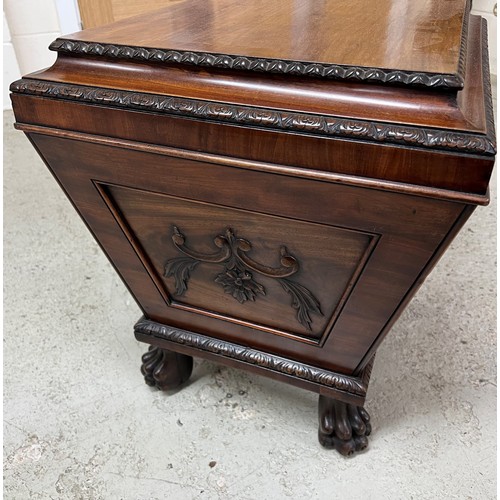 569 - Fine Regency mahogany cellarette, of sarcophagus form with a hinged cover enclosing a metal lined in... 