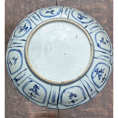 226 - Chinese blue and white porcelain circular dish, in the 'Kraak' style, the centre decorated with bird... 