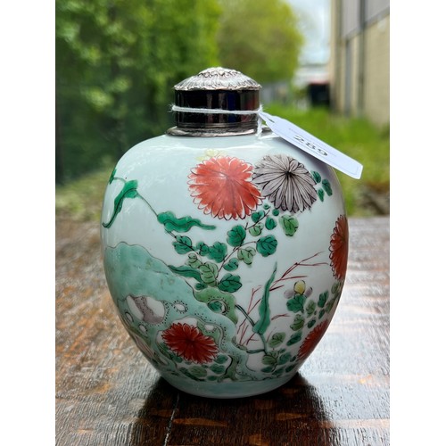 289 - Chinese famille verte porcelain ginger jar with a repoussé white metal cover, painted with chrysanth... 