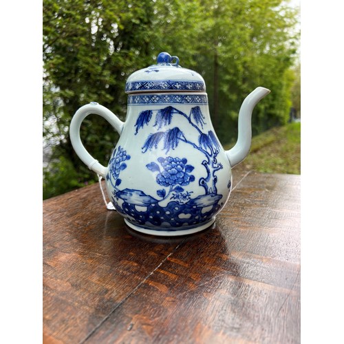 302 - Chinese export blue and white porcelain teapot and cover, with a berry finial and decorated with tre... 