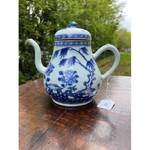 302 - Chinese export blue and white porcelain teapot and cover, with a berry finial and decorated with tre... 