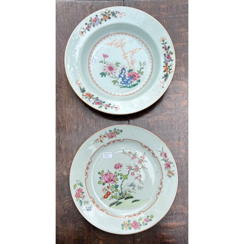 232 - Two Chinese famille rose porcelain plates and a shallow bowl, each decorated with flowers, Qianlong,... 