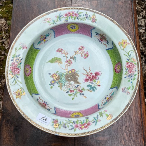 239 - Large Chinese export famille rose porcelain circular shallow bowl, painted centrally with flowers wi... 