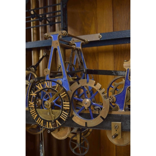 1319 - Good cast iron three train turret clock playing on five tubular bells, bearing a maker's silver plat... 