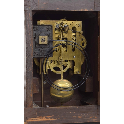 2310 - Junghans walnut two train mantel clock striking on a gong, within an architectural pillared case sur... 