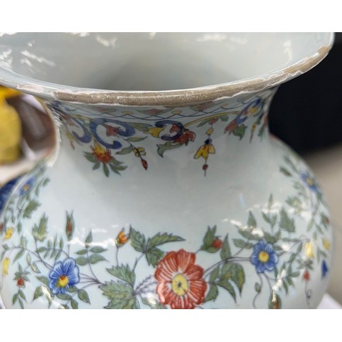 188 - Dutch Delft blue and white pottery circular dish, decorated with a jardinière of flowers within a de... 