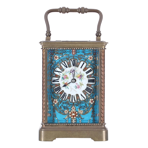 2511 - Reproduction porcelain panelled carriage clock striking on a gong, within a corniche brass case, 7.5... 