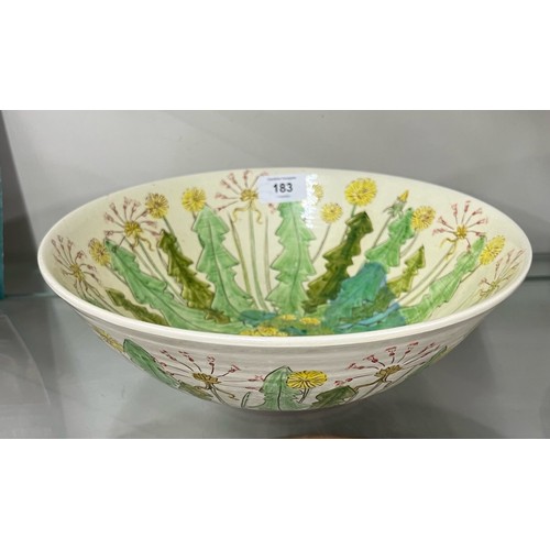 183 - Jenni Phillips studio pottery bowl, decorated with stylised wildflowers and leaves on a pale natural... 