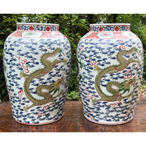 270 - Good pair of large Chinese porcelain vases converted to table lamps, profusely decorated with green ... 